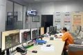 Công nhân trực ca đêm theo dõi hoạt động của các thiết bị tại Nhà máy Thủy điện An Khê. Ảnh: Văn Cường