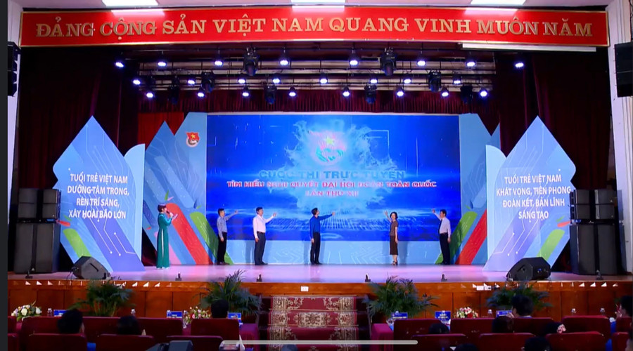 Các đại biểu nhấn nút khởi động cuộc thi trực tuyến tìm hiểu Nghị quyết Đại hội Đoàn toàn quốc lần thứ XII. Ảnh chụp màn hình Các đại biểu nhấn nút khởi động cuộc thi trực tuyến tìm hiểu Nghị quyết Đại hội Đoàn toàn quốc lần thứ XII. Ảnh chụp màn hình