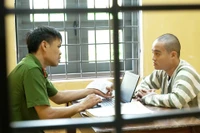 Lực lượng Công an đấu tranh với đối tượng Nguyễn Gia Ngọc Thành. Ảnh: Văn Ngọc