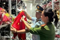Khởi tố chủ kho hàng kinh doanh hơn 35.000 bộ quần áo giả nhãn hiệu nổi tiếng