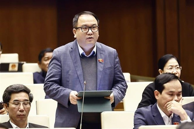 Quốc hội thảo luận về dự án Luật sửa đổi, bổ sung một số điều của Luật Tổ chức Quốc hội chiều 12.2. Ảnh: Doãn Tấn/TTXVN Quốc hội thảo luận về dự án Luật sửa đổi, bổ sung một số điều của Luật Tổ chức Quốc hội chiều 12.2. Ảnh: Doãn Tấn/TTXVN