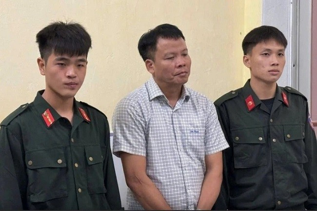 Ông Đồng Xuân Thụ lúc bị bắt. Ảnh: Công an cung cấp