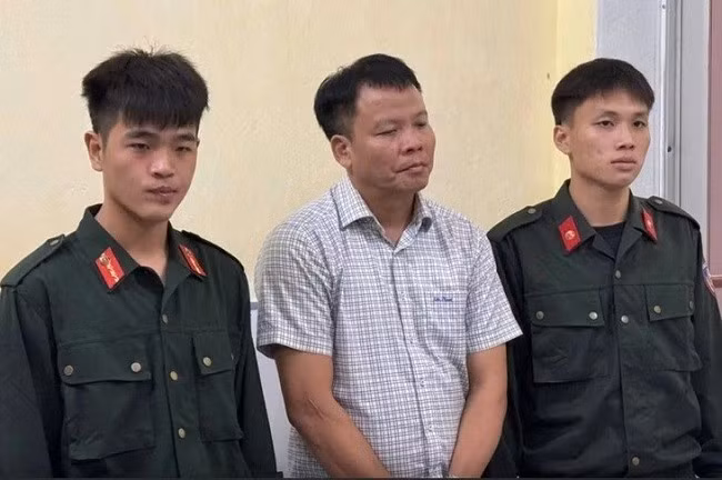 Ông Đồng Xuân Thụ lúc bị bắt. Ảnh: Công an cung cấp