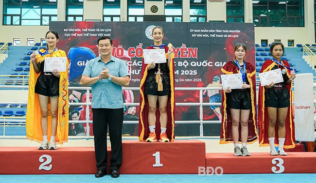 VĐV Nguyễn Thị Thanh Tiền giành HCV ở nội dung đối kháng, hạng cân 48 - 51 kg nữ, hình thức 2, góp phần vào thành tích chung của đoàn. Ảnh: MINH TUẤN VĐV Nguyễn Thị Thanh Tiền giành HCV ở nội dung đối kháng, hạng cân 48 - 51 kg nữ, hình thức 2, góp phần vào thành tích chung của đoàn. Ảnh: MINH TUẤN