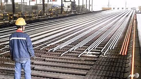 Sản xuất thép ở Trung Quốc. Ảnh: AFP.