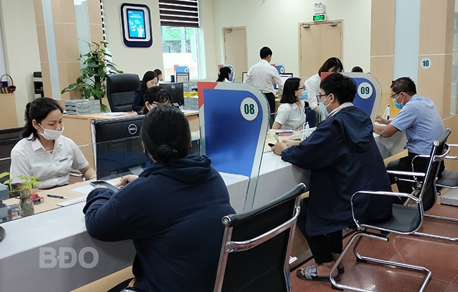 Nhiều khách hàng đến BIDV Bình Định giao dịch tín dụng. Ảnh: T.SỸ Nhiều khách hàng đến BIDV Bình Định giao dịch tín dụng. Ảnh: T.SỸ