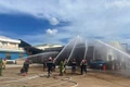 Quang cảnh buổi diễn tập phương án chữa cháy và cứu nạn, cứu hộ tại Công ty cổ phần Chế biến gỗ nội thất Thành Tâm.