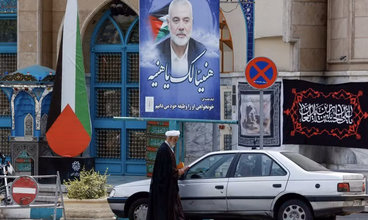 Hình ảnh thủ lĩnh Hamas Haniyeh treo ở quảng trường Palestine ở Tehran, Iran. Ảnh: AFP