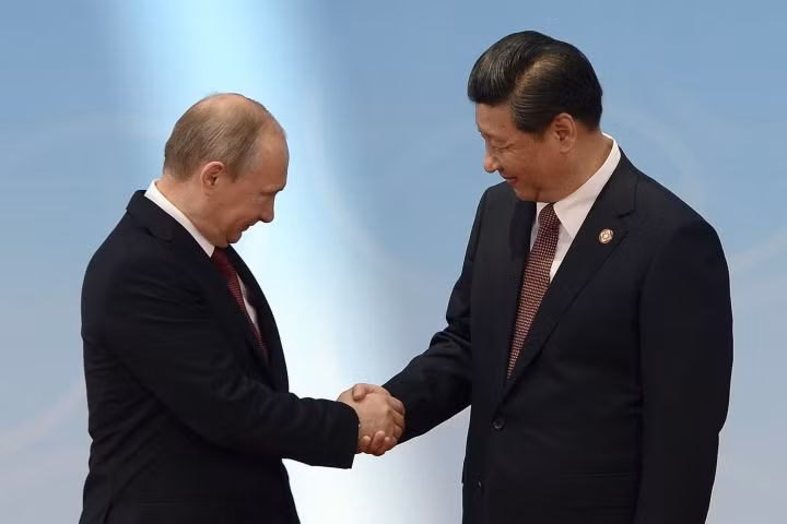 Tổng thống Nga và Chủ tịch Trung Quốc. Ảnh: The New York Times