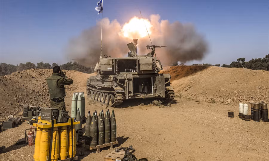 Pháo tự hành Israel tấn công mục tiêu dải Gaza hồi tháng 11. Ảnh: AFP Pháo tự hành Israel tấn công mục tiêu dải Gaza hồi tháng 11. Ảnh: AFP