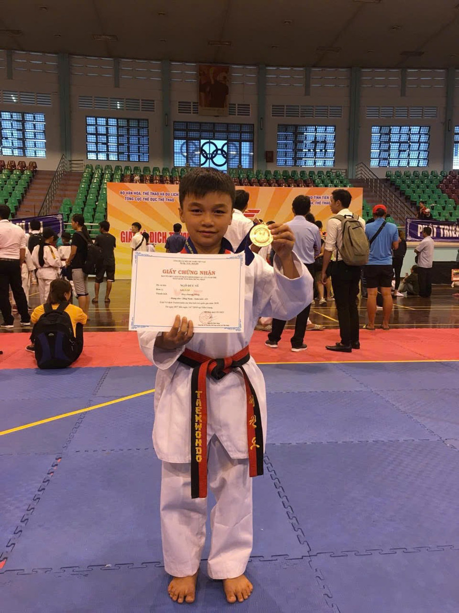 Ngô Đức Sỹ đoạt huy chương đồng tại Giải vô địch Taekwondo các lứa tuổi trẻ toàn quốc năm 2018. Ảnh: NVCC kanh.jpg
