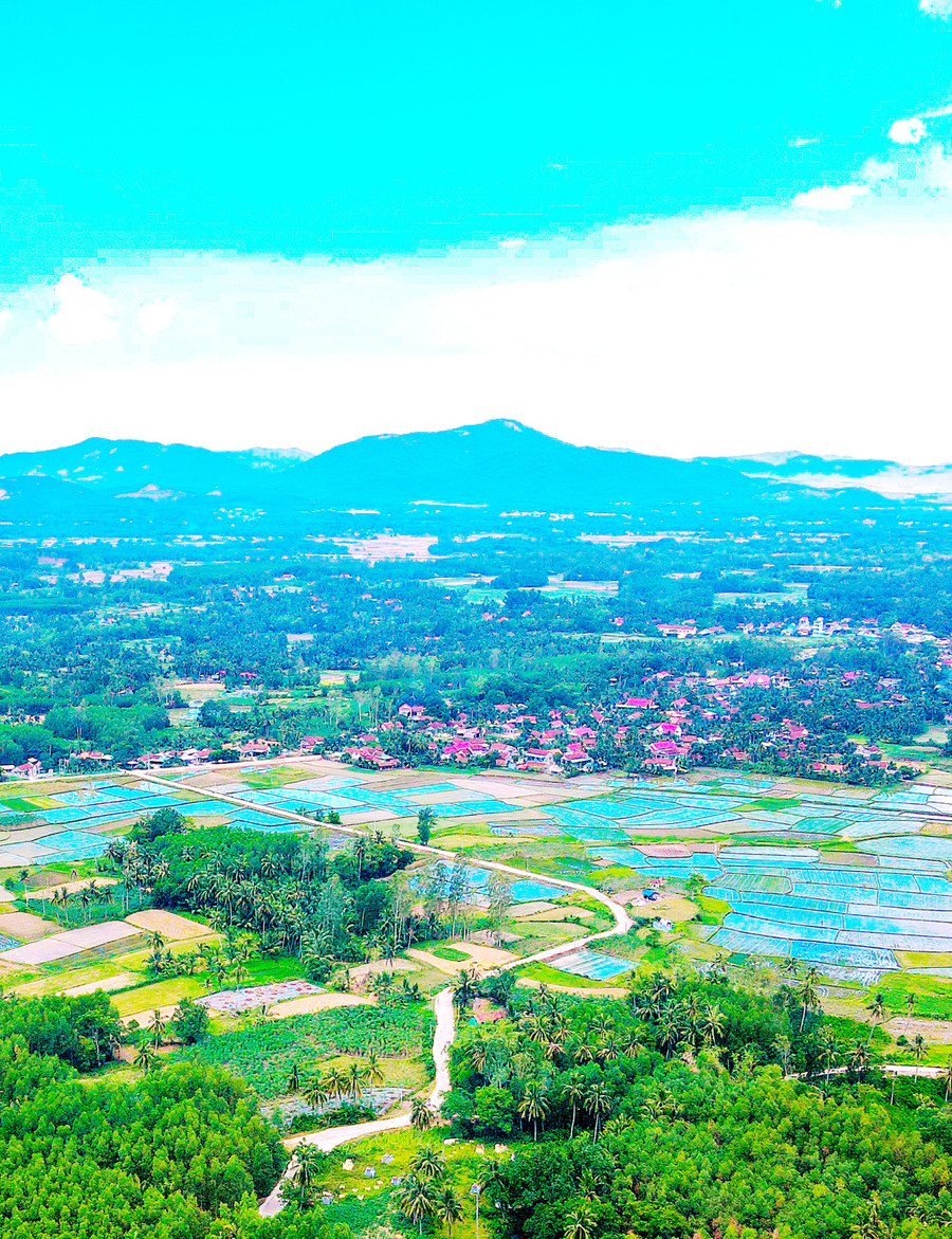 Làng quê yên ả dưới chân núi ở Phù Mỹ Tây. Ảnh: Đoan Ngọc 1-1363.jpg