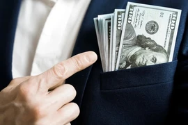 Hơn 680.000 người trên thế giới đã trở thành triệu phú mới vào năm 2024. (Ảnh: Getty)