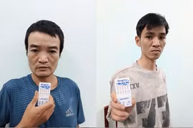 Từ trái sang: Đối tượng Đặng Văn Bảo và Đặng Hoài Đức. Ảnh: ĐVCC