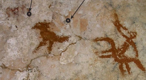 Phát hiện tác phẩm nghệ thuật trên đá cổ nhất thế giới ở Indonesia