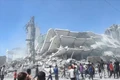 Tòa nhà bị phá hủy sau cuộc không kích của Israel xuống Dải Gaza. Ảnh: IRNA/TTXVN