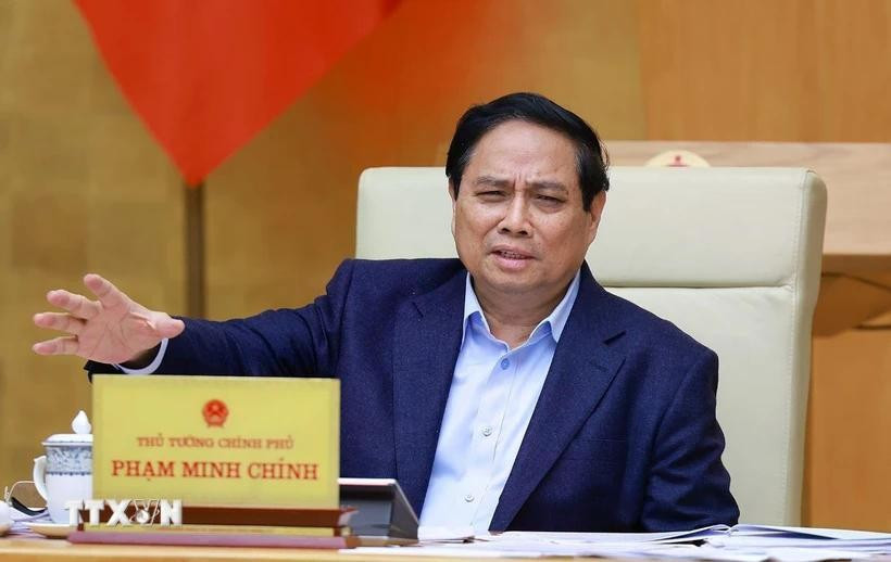 Thủ tướng Phạm Minh Chính chủ trì Phiên họp Chính phủ thường kỳ tháng 2 năm 2025. (Ảnh: Dương Giang/TTXVN) khan-truong-hoan-thien-tinh-gon-bo-may-dd.jpg