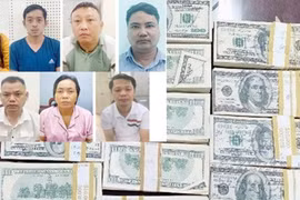 Khởi tố 7 đối tượng trong đường dây mua bán USD giả
