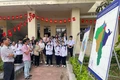 Tiến sĩ Lưu Hồng Sơn (Bảo tàng Pleiku) giới thiệu về di sản Hán-Nôm trên địa bàn tỉnh Gia Lai tới đại biểu và các em học sinh. Ảnh: Vũ Chi 