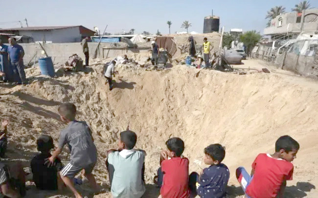 Xung đột ở Dải Gaza đã khiến khoảng 21.000 trẻ em bị mất tích. Ảnh: AP Xung đột ở Dải Gaza đã khiến khoảng 21.000 trẻ em bị mất tích. Ảnh: AP