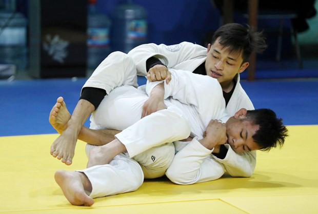 Đội tuyển võ Jujitsu đang nỗ lực tập luyện tại Trung tâm Huấn luyện Thể thao Quốc gia. Ảnh: Hoàng Hiếu/TTXVN
