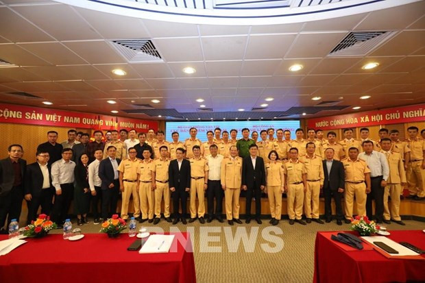 Cục Đăng kiểm Việt Nam tiếp nhận 50 cảnh sát giao thông hỗ trợ kiểm định xe cơ giới. Ảnh: Quang Toàn/TTXVN