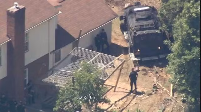 Hiện trường vụ đấu súng ở TP.Charlotte (Bắc Carolina). Ảnh: Chụp từ clip của Đài WSOC