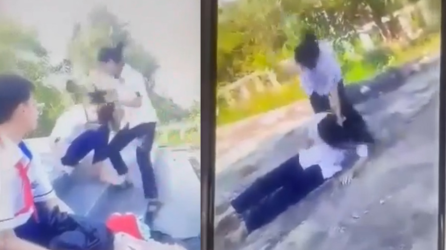 Nữ sinh lớp 8 bị bạn học đánh vào chiều 23.3. Ảnh cắt từ clip Nữ sinh lớp 8 bị bạn học đánh vào chiều 23.3. Ảnh cắt từ clip