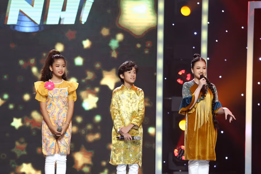 Khang Nguyên tranh tài cùng Thảo Nguyên, Phương Linh trong chung kết Hãy nghe tôi hát nhí. Ảnh: BTC