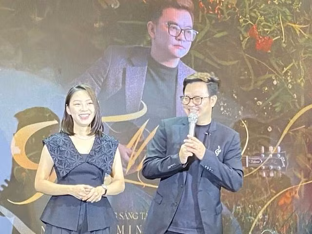 Nguyễn Minh Cường và bà xã Hoài Thu - người luôn ủng hộ và giúp anh có điều kiện thăng hoa hơn với nghề sáng tác