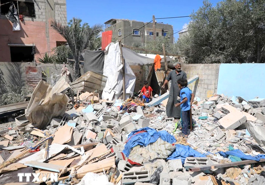 Cảnh đổ nát sau cuộc không kích của Israel tại Dải Gaza ngày 7-5. Ảnh: THX/TTXVN Cảnh đổ nát sau cuộc không kích của Israel tại Dải Gaza ngày 7-5. Ảnh: THX/TTXVN