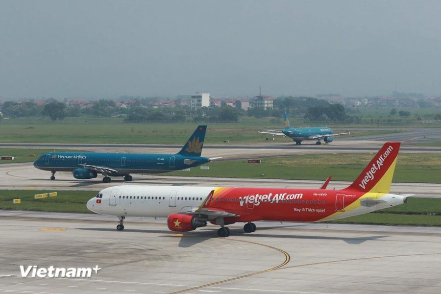 Máy bay của các hãng hàng không tại một sân bay nội địa. (Ảnh: PV/Vietnam+) Máy bay của các hãng hàng không tại một sân bay nội địa. (Ảnh: PV/Vietnam+)