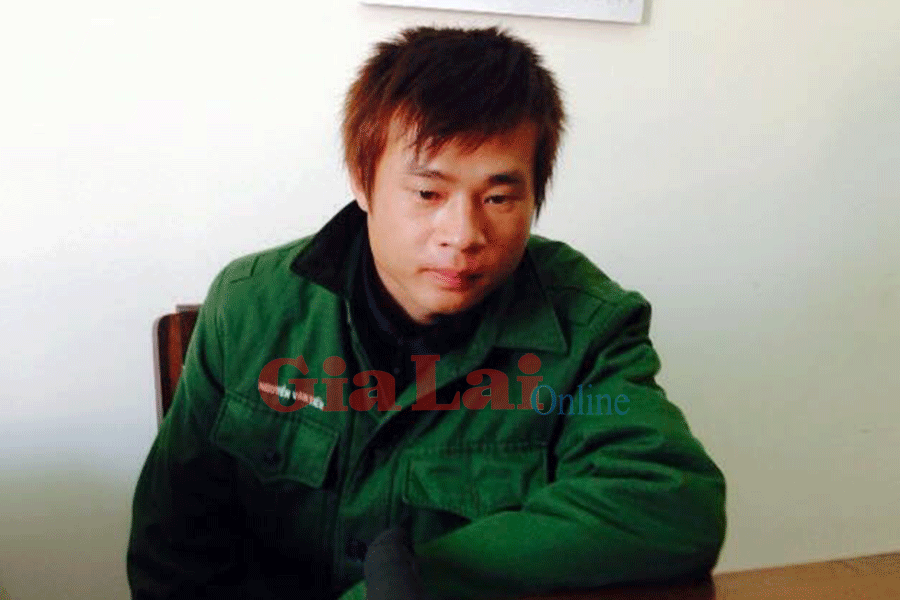 Đối tượng Nguyễn Văn Tiến tại cơ quan Công an. Ảnh: Hữu Trường