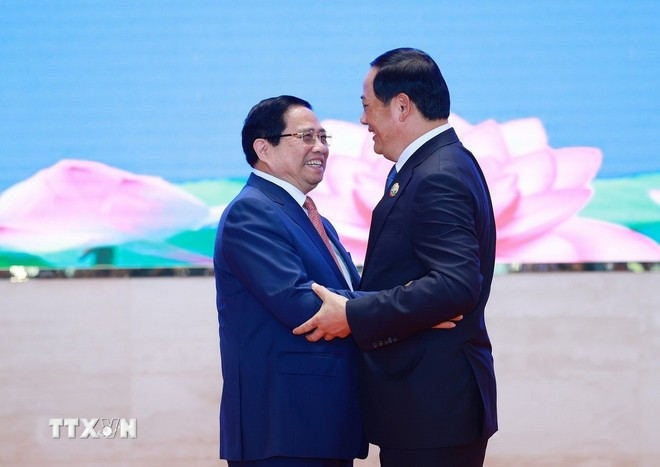 Thủ tướng Phạm Minh Chính và Thủ tướng Lào Sonexay Siphandone đồng chủ trì Kỳ họp lần thứ 48 Ủy ban liên Chính phủ về hợp tác song phương Việt Nam-Lào. Ảnh: Dương Giang/TTXVN