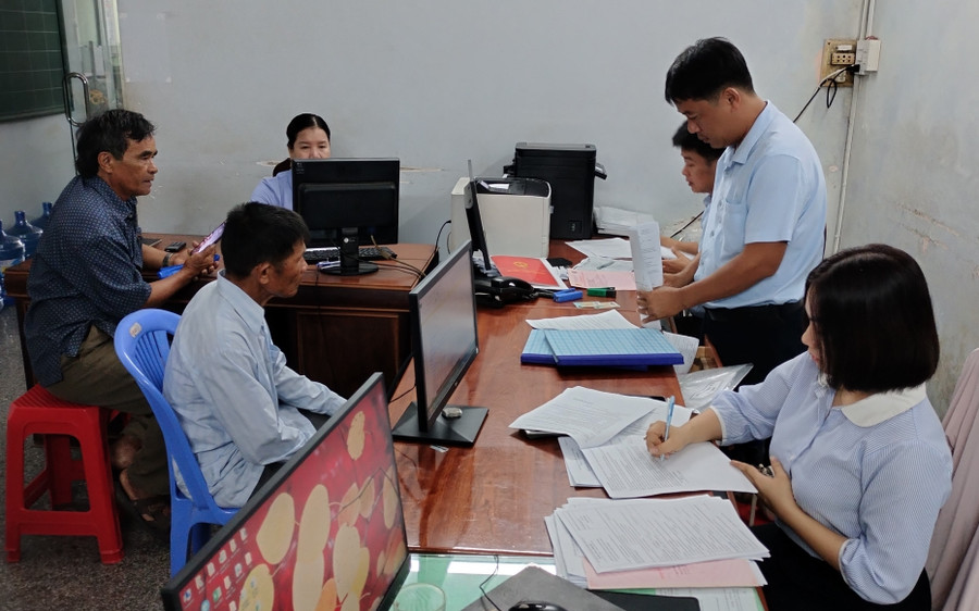 Hoạt động tín dụng tại QTDND Nhơn Lộc. Ảnh: T.Sỹ quy-dinh-tai-chinh.jpg