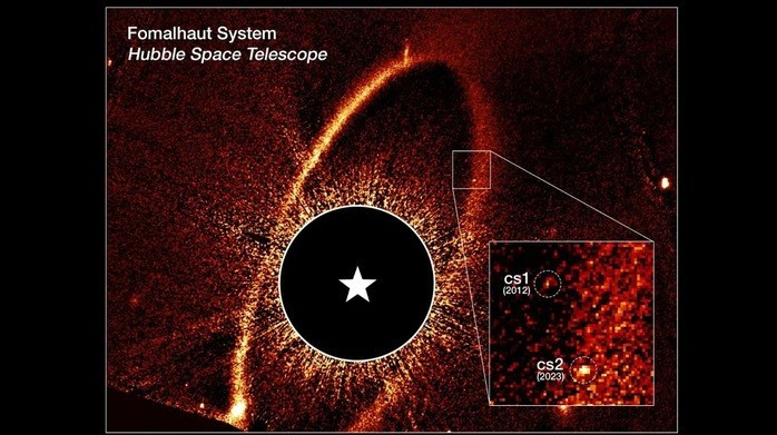 Mắt Sauron và hai sự kiện ngoạn mục xảy ra bên trong nó, phản ánh quá khứ của Trái Đất. Ảnh: NASA/ESA/Đại học California ở Berkeley