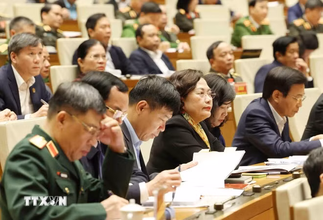 Đại biểu tham dự hội nghị tại điểm cầu chính Hội trường Diên Hồng, Nhà Quốc hội, chiều 7/2. Ảnh: Phương Hoa/TTXVN