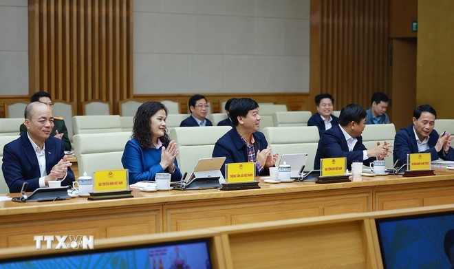 Các đại biểu tham dự Hội nghị sơ kết triển khai xây dựng nhà cho nhân dân bị thiệt hại do bão lũ tại khu vực miền Trung. Ảnh: Dương Giang/TTXVN