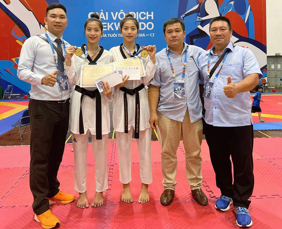 Cặp nữ võ sĩ song sinh đã giành huy chương vàng cho đoàn Gia Lai. Ảnh: Đức Nhật