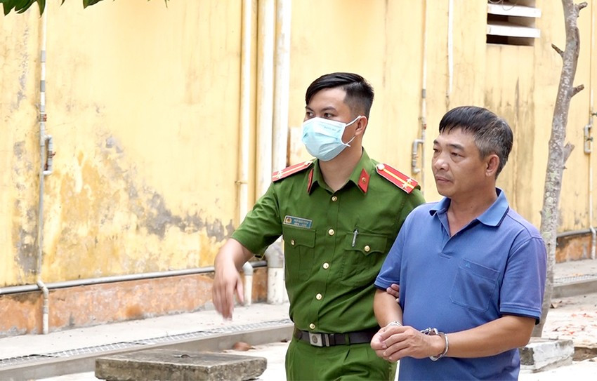 Lê Văn Trường được áp giải về nơi tạm giam. (Ảnh: TTXVN)