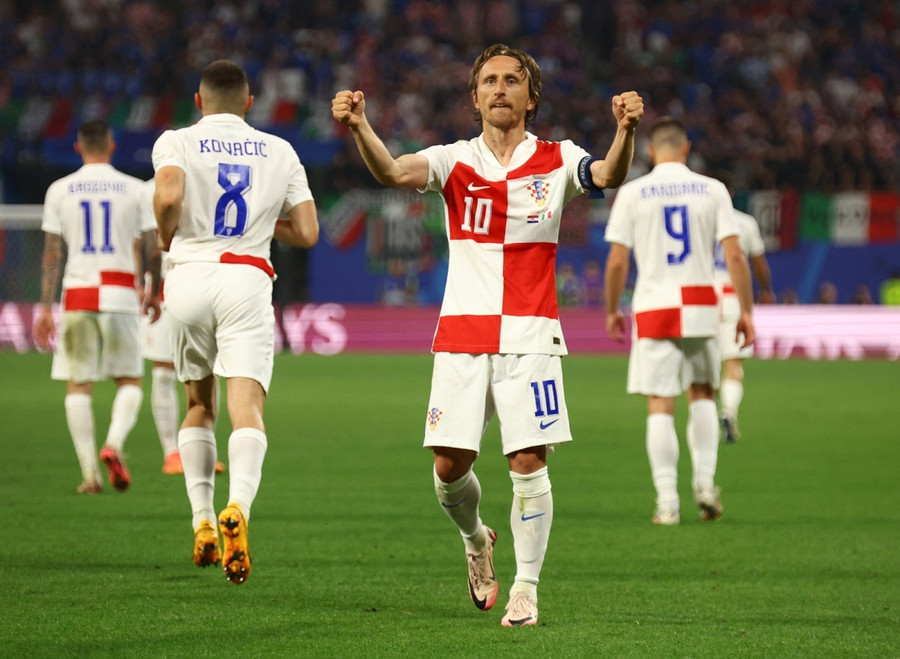 Lão tướng Luka Modric ghi bàn nhưng không thể mang về chiến thắng cho Croatia. Ảnh: Reuters