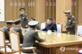 Nhà lãnh đạo Triều Tiên Kim Jong-un tại cuộc họp cùng các quan chức an ninh cấp cao ngày 14-10. Ảnh: KCNA