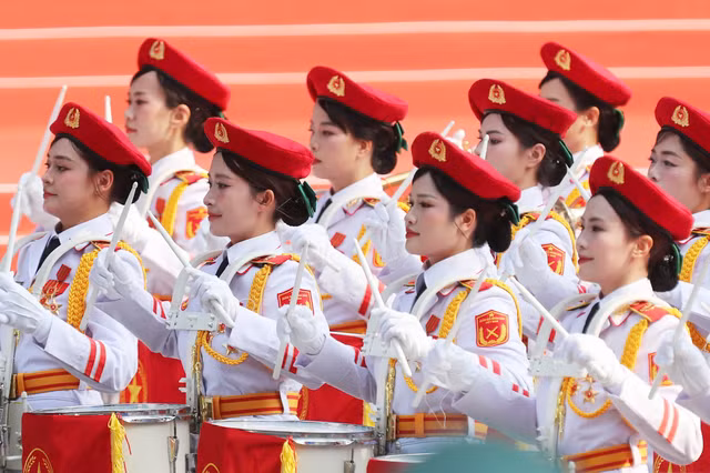 Khối nữ quân nhạc trong diễu binh, diễu hành kỷ niệm 50 năm Ngày giải phóng miền Nam, thống nhất đất nước. Ảnh: Hoàng Triều