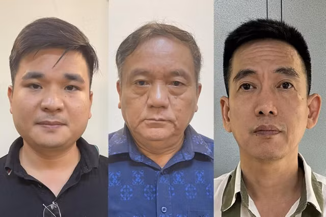Trần Văn Tuynh (giữa) cùng nhiều bị can trong vụ án. Ảnh: Bộ Công an