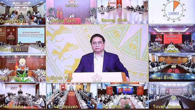 Thủ tướng Phạm Minh Chính chủ trì hội nghị trực tuyến đẩy mạnh giải ngân vốn đầu tư công năm 2023. (Ảnh: Dương Giang/TTXVN)