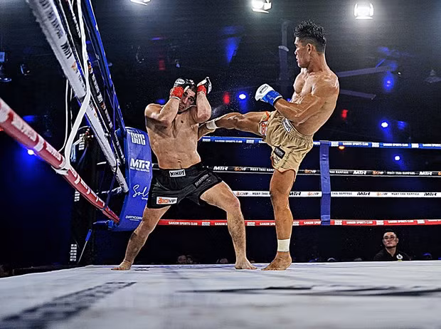 Võ sỹ Trần Quốc Tuấn thi đấu và giành chiến thắng ở hạng cân 68kg. (Ảnh: Thành Chung/Vietnam+)