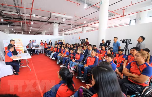 Quang cảnh buổi gặp mặt, chúc mừng thành tích của Đoàn thể thao người khuyết tật Việt Nam tại ASEAN Para Games 12. (Ảnh: Hoàng Minh/TTXVN) Quang cảnh buổi gặp mặt, chúc mừng thành tích của Đoàn thể thao người khuyết tật Việt Nam tại ASEAN Para Games 12. (Ảnh: Hoàng Minh/TTXVN)