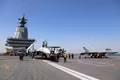 Tiêm kích J-15T, J-35 và máy bay cảnh báo sớm KongJing-600 trên tàu sân bay Phúc Kiến của Trung Quốc. Ảnh: THX/TTXVN
