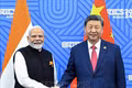 Thủ tướng Ấn Độ Narendra Modi (trái) và Chủ tịch Trung Quốc Tập Cận Bình tại cuộc gặp bên lề Hội nghị cấp cao BRICS ở Kazan, Nga, ngày 23-10-2024. Ảnh tư liệu: ANI/TTXVN