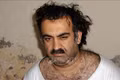 Kẻ chủ mưu vụ khủng bố ngày 11-9-2001 Khalid Sheikh Mohammed trong ảnh công bố hồi tháng 3-2003. Ảnh: AP/TTXVN